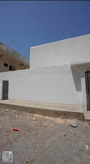 Villa for sale in Ajman, consisting of a ground floor and first floor, featuring 17 bedrooms and 13 