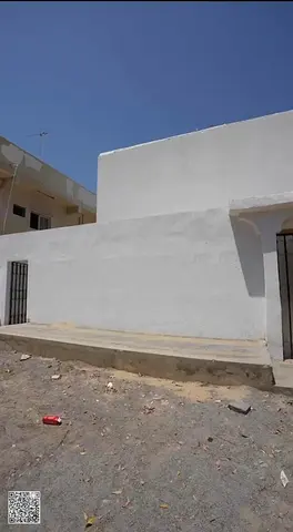 Villa for sale in Ajman, consisting of a ground floor and first floor, featuring 17 bedrooms and 13 bathrooms, with a net annual return of 12.7%.
