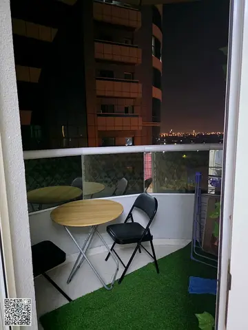 With a beautiful sea view from the balcony - For sale - One-bedroom apartment in A1 Tower (Orient Towers) - Ajman