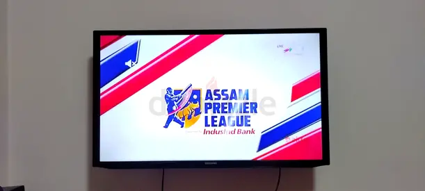 Samsung 36-inch LED TV mounted on wall - good working condition