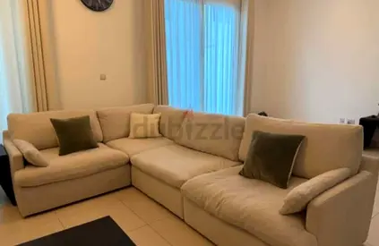 Home Center swin feather filled sofa
