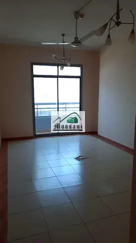 شقة استوديو واسعة + شرفة (إطلالة مفتوحة بالكامل) + موقف سيارات مغطى + حمامات كبيرة متاحة للإيجار في برج موساني، عجمان.