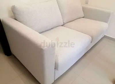 Comfortable beige 2-seater sofa bed ikea vimle