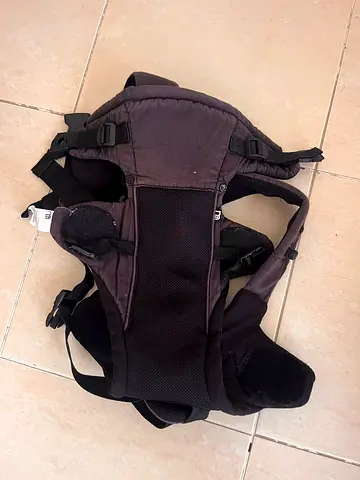 Well-used black baby carrier / front baby sling Mothercare