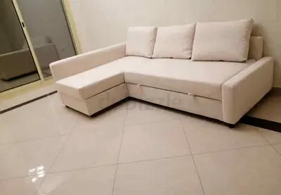 Cream L-Shaped Sofa Bed with Storage