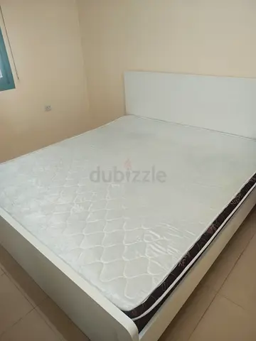 Queen bed frame with mattress - good condition