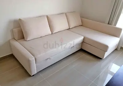 Beige L-shaped Sofa with Storage — Good Condition