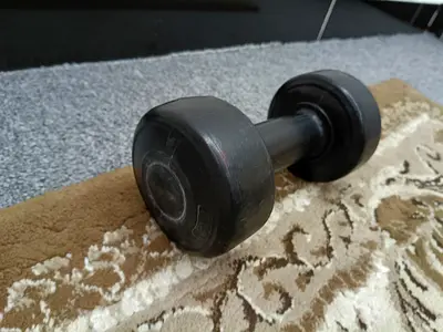 Free, small,plastic/vinyl or cement-filled dumbbell