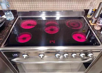 Smeg brand 5 burner electric cooker 90cm likes new condition perfect working