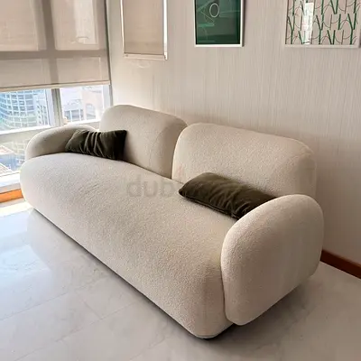 Cream boucle 3-seater sofa — modern curved design