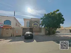 Corner villa for sale in Al Rawda area, price includes electricity and water. Freehold ownership for