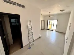 1BHK in Al Jurf 3, spacious, balcony, central AC, prime location, AED 30K.