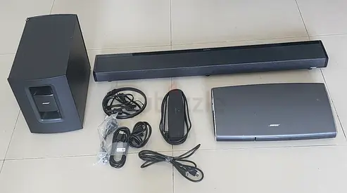 Bose Soundbar with Subwoofer and Remotes - Good Working Condition.