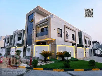 Villa for sale in Ajman, Al Zahia, corner lot, including registration fees. 6 master bedrooms, livi