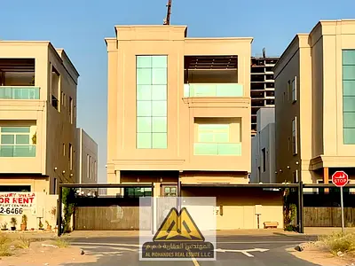 For rent in Al-Amirah area, a villa with an elevator, ready for immediate occupancy. It features a front parking area, a spacious yard, and consists o