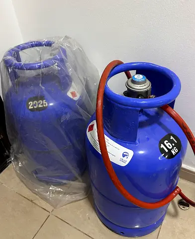 Two LPG gas cylinders with hose and regulator - good condition
