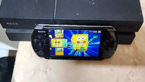 Sony PSP | Modded with games | Charger