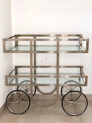 Stainless Steel & Glass Serving Bar Cart on Wheels light used. Brought from Marina Homes