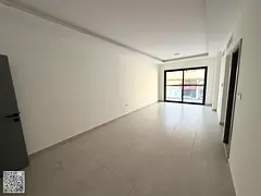 Two bedrooms and a living room, central air conditioning, built-in wardrobes, first occupancy, next
