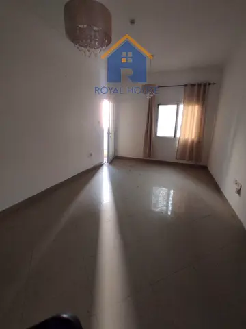 Apartment with a living room in Al Taawun, featuri