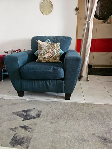 Comfortable Blue Fabric Armchair with Decorative Cushion