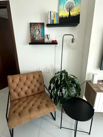 Modern Tufted Armchair and Round Black Side Table