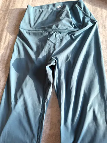 Light blue/teal women's workout leggings - size unknown, good condition