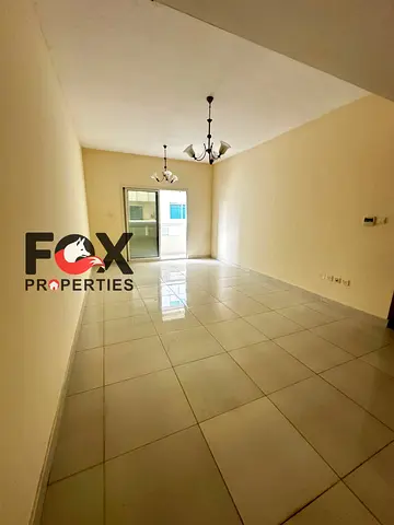 Annual rent premium 1BR master / spacious layout / 2 bathrooms / balcony / central AC / Al Rashidiya 1 / AED 32K with parking