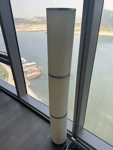 Tall cylindrical white floor lamp - minimalist design