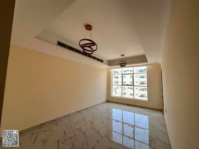 A two-bedroom apartment with a living room and an excellent view in a prime location in the Al Nuaimiya area.