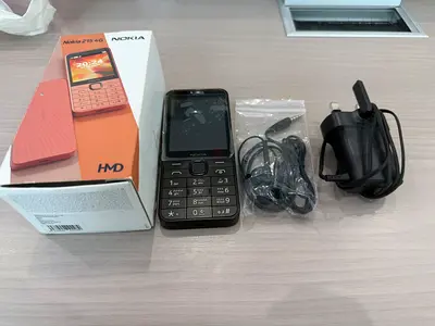 Nokia 215 4G basic phone dual sim with box, charger and earphones