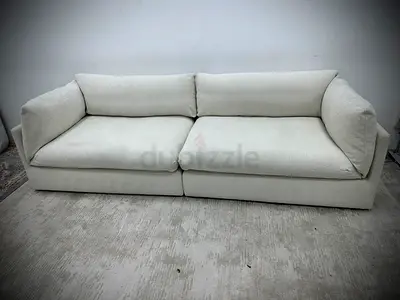 Like new condition the loom collection three seater sofa