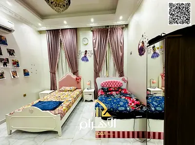 Luxury villa for sale in Al Yasmin area, with 5 bedrooms, living room, and majlis. Attractive price, includes water, electricity, and air conditioning