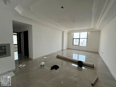 Luxury two-bedroom apartment for annual rent in Ajman Al Rashidiya, 1 month free, with gym, swimming pool and aqua park.