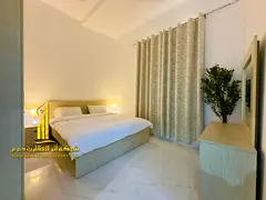 Furnished two-bedroom apartment for monthly rent in Al Nuaimiya 2. Includes utilities, internet, and