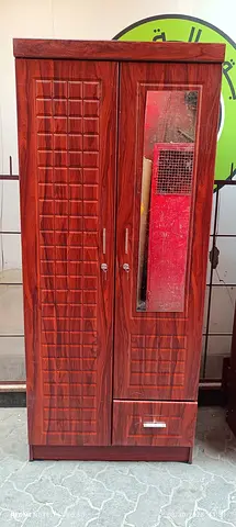 We are selling double door wood cupboard brand new available