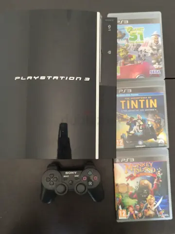 Sony PlayStation 3 with controller and 3 games