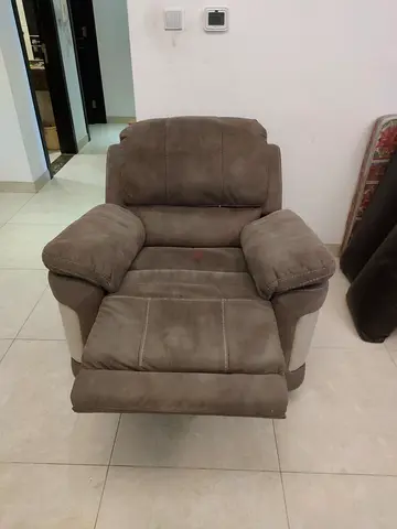 Comfortable single-seater reclining armchair in brown suede material