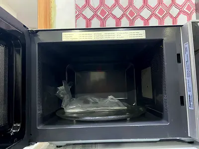 Used countertop microwave oven with turntable - good working condition