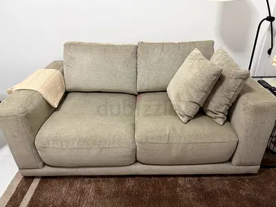 Comfortable 2-Seater Sofa in Light Taupe - Very Good Condition.