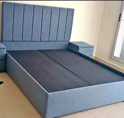 Blue fabric double bed frame with headboard