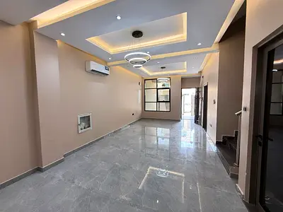 A distinctive villa in Al Zahia, Ajman, with 5 rooms, a majlis, a hall, and a kitchen. Air conditioners are available. It is located next to a mosque