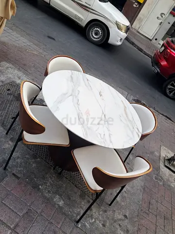Round Marble-Top Dining Table with 4 Modern Curved Chairs