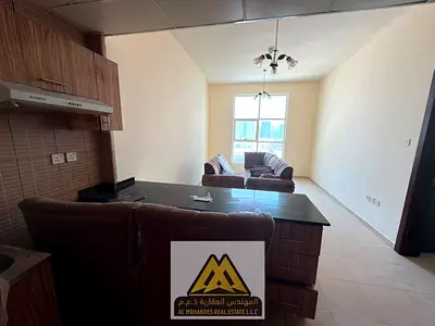 One bedroom, living room, and balcony with an open view inside City Towers. Prime location with all services.