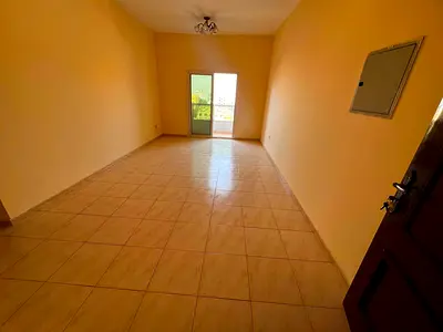Private parking space, large area, and balcony with excellent views in Al Rashidiya 2, next to Falc