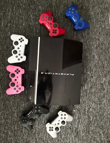 PlayStation 3 console with 7 wireless controllers - working condition
