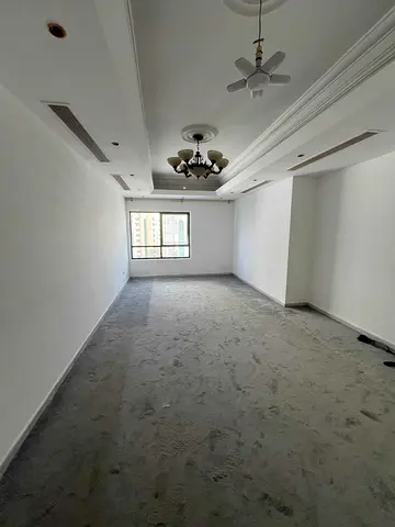 One-bedroom apartment with a living room in Al Majaz 3; situated in a prime location with full amen