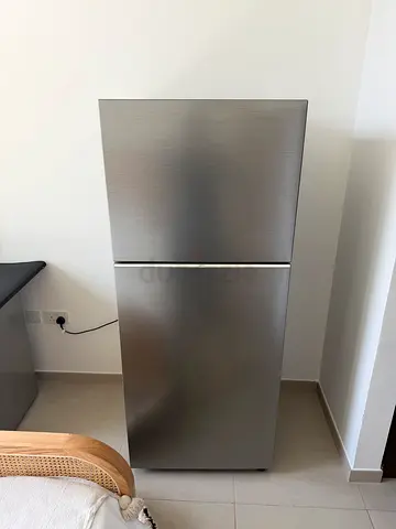 Samsung new latest model Stainless steel top-freezer refrigerator - good condition