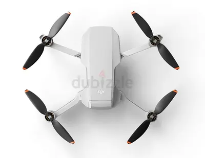 DJI Mini series compact camera drone (like Mini 2) - light, foldable and ready to fly
