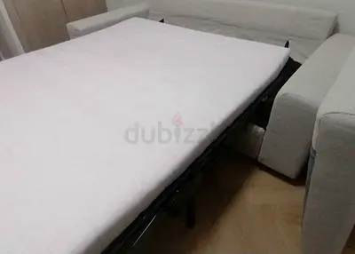 Light grey fabric sofa bed - good condition